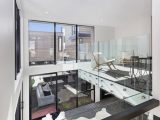 Interior upstairs with large windows